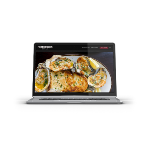Portobellos Website On Laptop clear